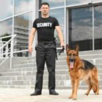 A security guard and his dog