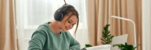 A woman works on her computer